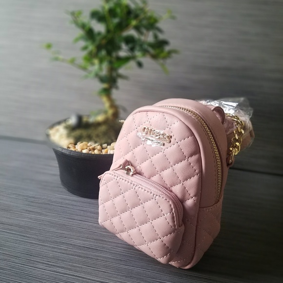 Guess Handbags - NWT pink Faux Leather Quilted Mini Backpack